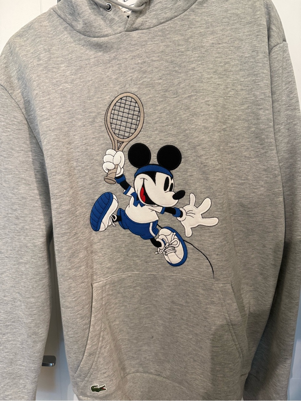 DISNEY X LACOSTE Grey Hoodie with Blue & Black Mickey Tennis Graphic